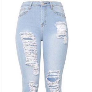 Light blue ripped jeans